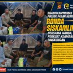 Bhabinkamtibmas Polsek Pasar Kemis Ronda Siskamling Bersama Warga, Perkuat Keamanan Lingkungan