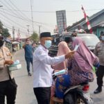 Polsek Kresek Polresta Tangerang Bagikan Masker ke Pengguna Jalan, langkah Antisipasi Dampak Abu Vulkanik GAK